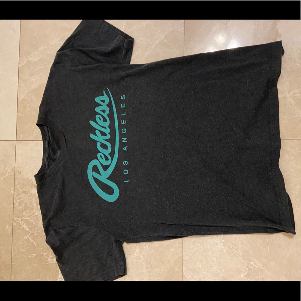 Young and reckless shirt size small